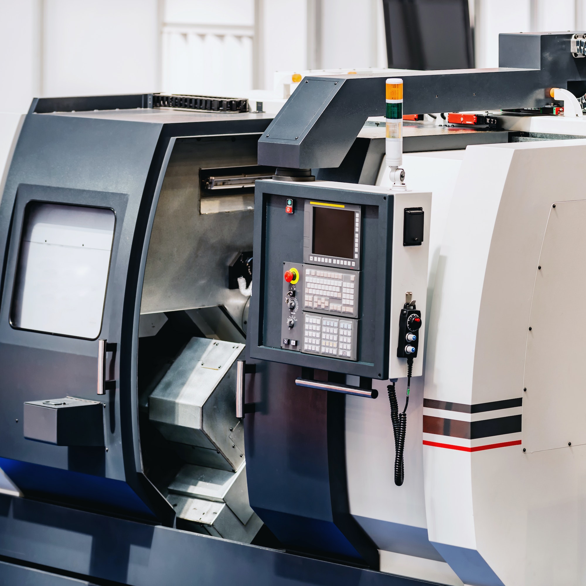CNC machine cutting a precision metal component
