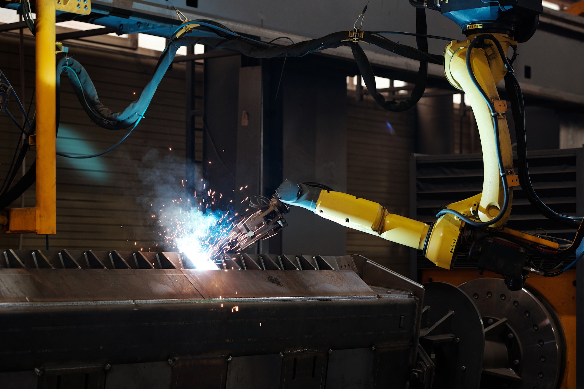 Arc welding of a large industrial machine during repair